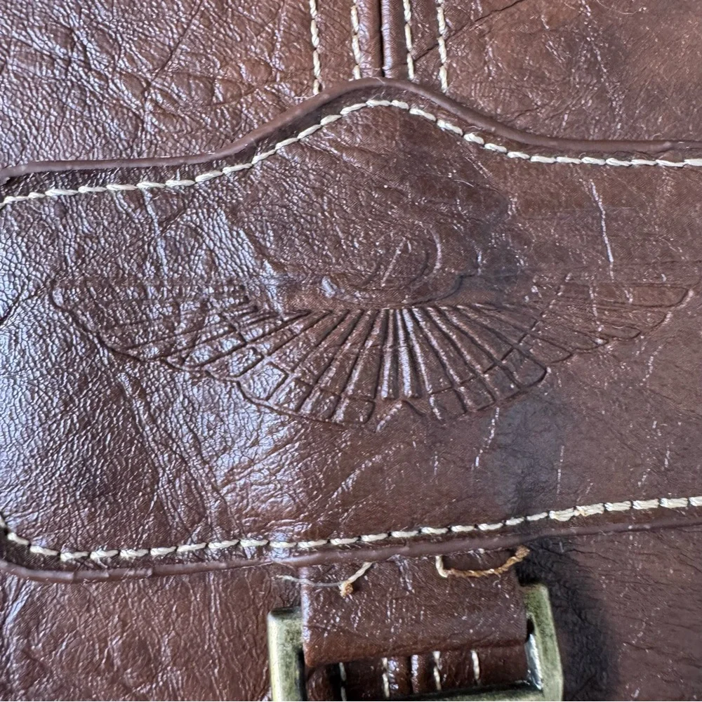 Brown Leather Backpack with Gold Accents